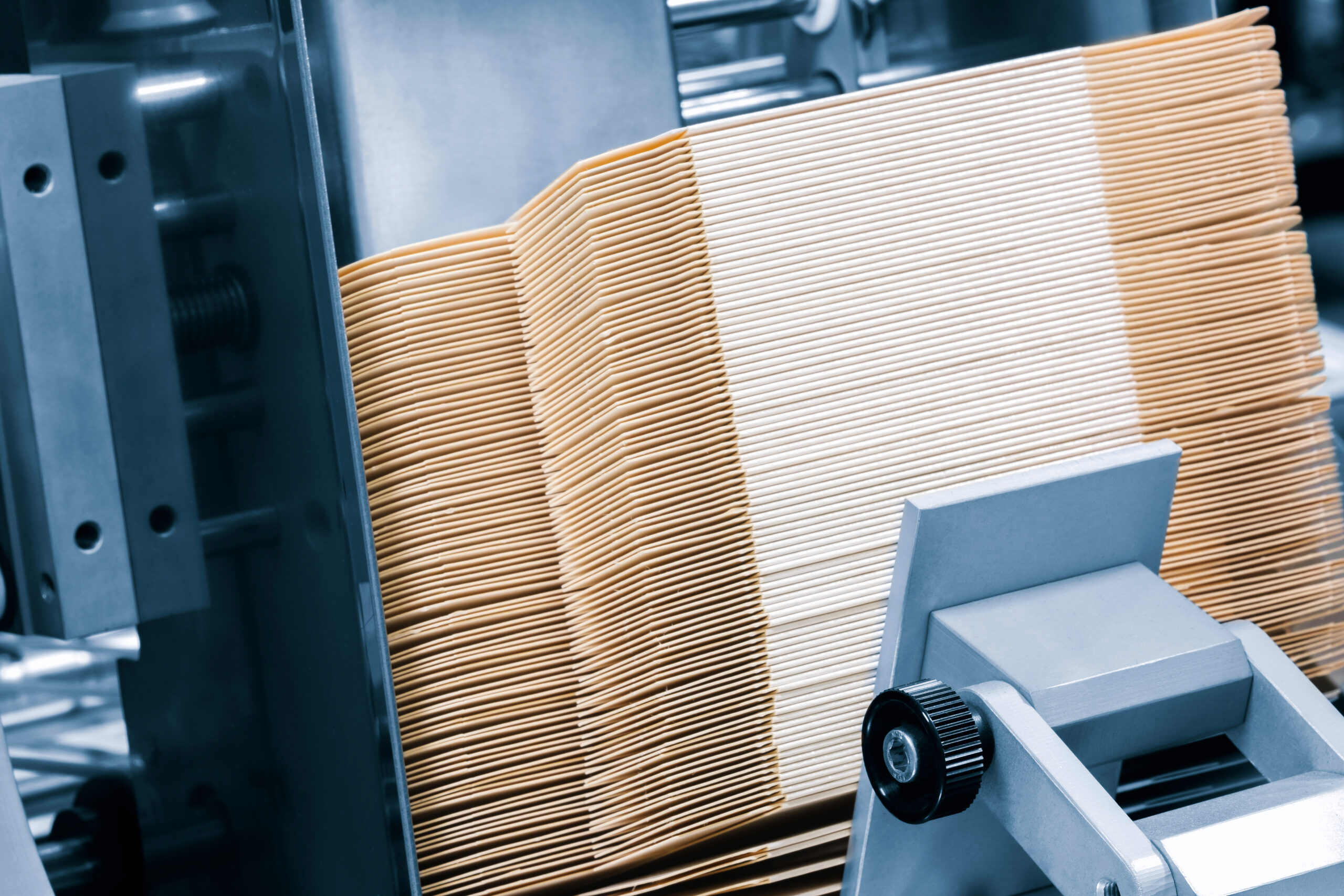 Corton boxes stacked in a packing conveyor line