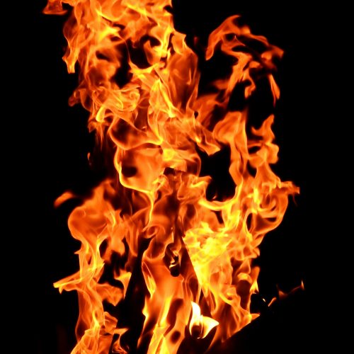 Can cardboard boxes be stored in flammable cabinets?