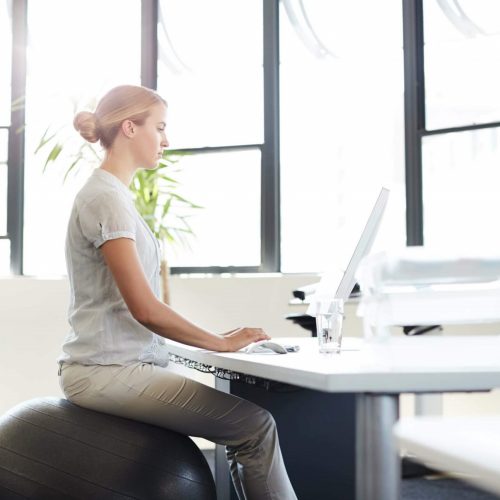Lady working at an ergonomic desk