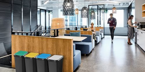 Recycling bins in breakout area