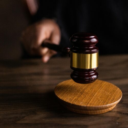 A gavel striking on wood