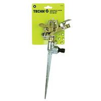 Metal sprinkler gun on metal spike