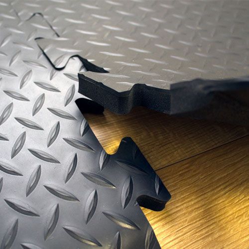 Anti-fatigue deckplate interlocking tiles. Anti-fatigue deckplate interlocking tiles.